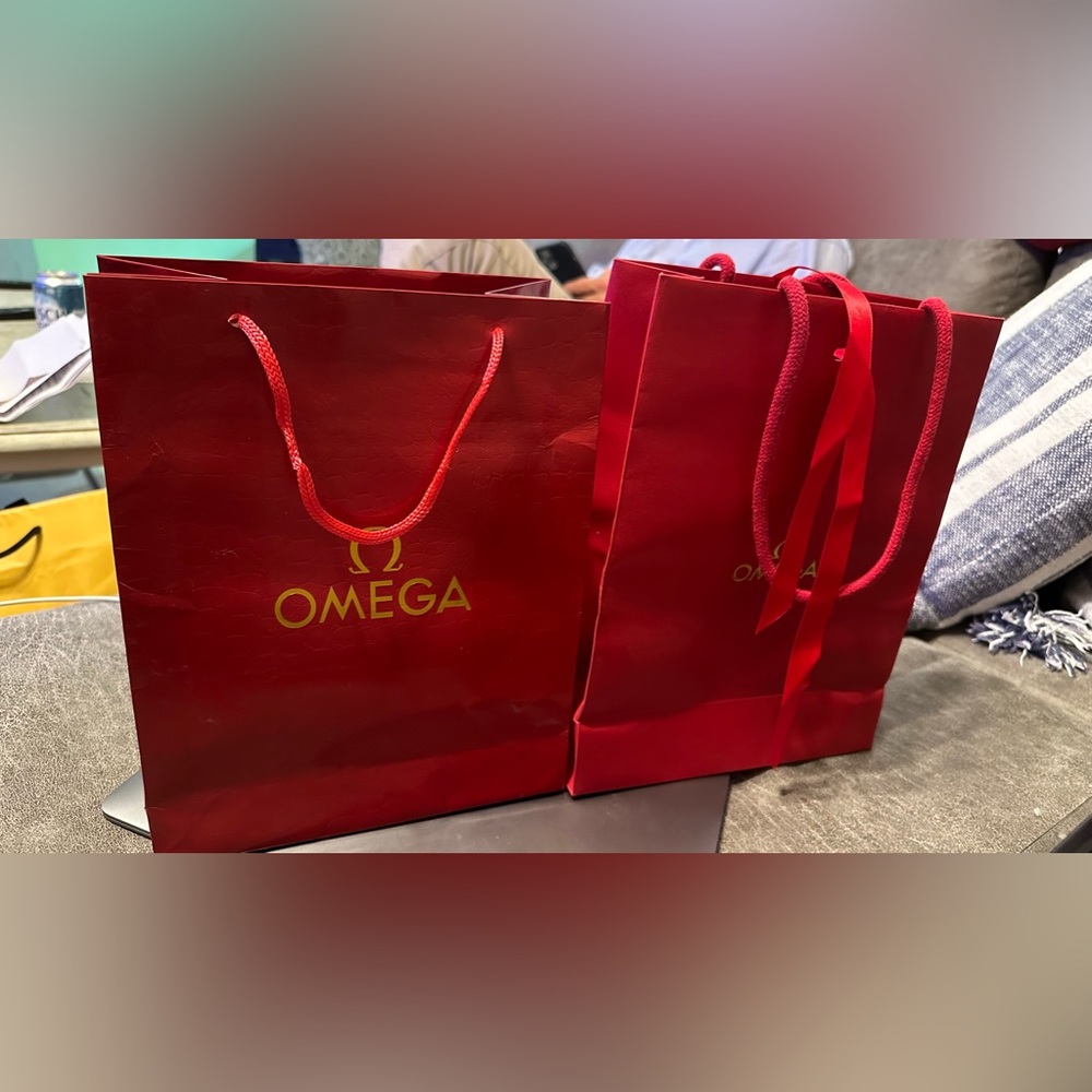 Omega shopping bags